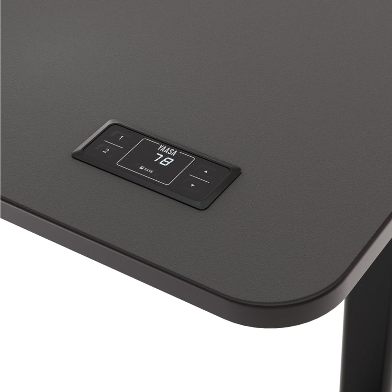 Der Handschalter zur Höhenverstellung mit Memory-Funktion beim Desk Pro 2 in der Farbe Dunkelgrau/Schwarz und Größe 160 x 80 cm.