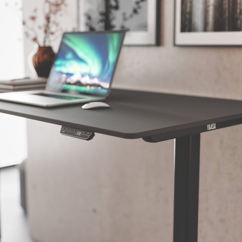 Mit dem Bedienelement am Desk Frame können vier Tischhöhen gespeichert werden.