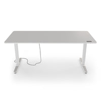 Desk Pro 2 mit hellgrauer Tischplatte 180 x 80 cm und eingebautem Bedienelement zur Höhenverstellung.